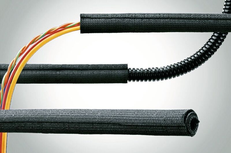 Der Polyester-Schutzschlauch Fipjack WPET-SFC fasst mit seinem selbsteinrollenden und überlappenden Gewebeband Leitungen einfach zusammen.  (FIP)