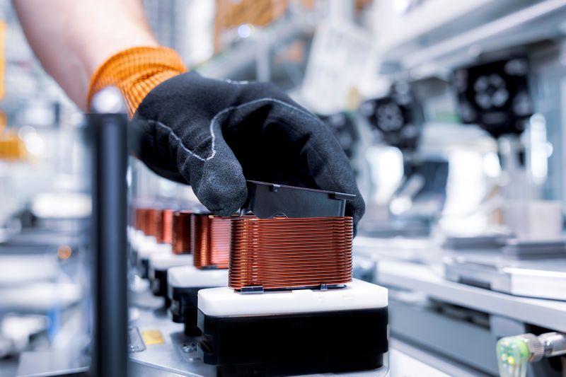The winding of the copper wire for the coil using rectangular wire is one of the processes that Mercedes-Benz has developed for the axial flux motor. (Source: Mercedes-Benz)