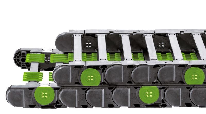 «Grüne» Automation: Die abriebfeste und leise Profilrollen-Energiekette P4 ermöglicht bei Bearbeitungs- und Lagerprozessen 57 % weniger Antriebsleistung bei 3 m/s und schneller.  (Bild: Igus)