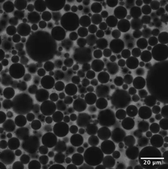 A microscopic close-up of the bubbles in foam, whose movements mathematically mirror the process of deep learning, used to train modern AI systems.(Source:  Crocker Lab)
