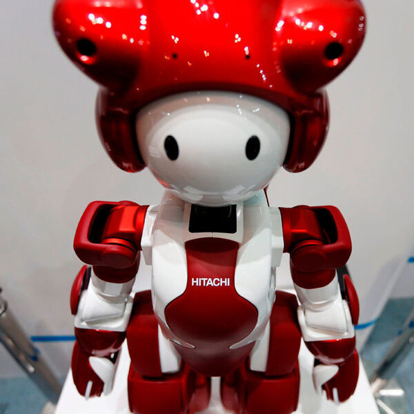 Was darf bei einer Technik-Messe in Japan nicht fehlen? Natürlich Roboter, wie z.B. Emiew3 von Hitachi. (dpa - Bildfunk)