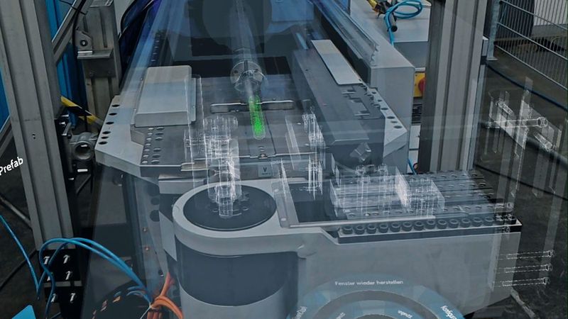 Über die Mixed-Reality-Brille wird jeder Arbeitsschritt nach und nach eingeblendet, steuern lässt sie sich mit Gesten.  (Uni Siegen)