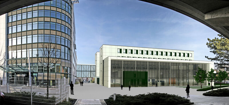 Die offen gestaltete Empfangshalle des neuen Kunden- und Schulungszentrums (rechts) aus Richtung Gustav-Heinemann-Brücke gesehen. (Plenge+Plenge)