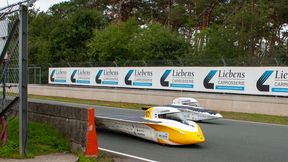 The Æthon solar cars in the foreground and the Adelie in the background on the racetrack in Zolder. (Source: Team Sonnenwagen)