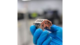 This 6061 aluminum engine block model demonstrates the high resolution and geometric control that can be produced in a new patent-pending binder jet 3D printing and sintering process developed by Ex One and Ford Motor. (Business Wire)