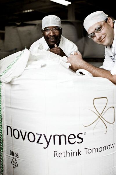 Two production workers leaning over a big bag in a warehouse in Franklinton, North Carolina, USA? (Picture: Novozymes)