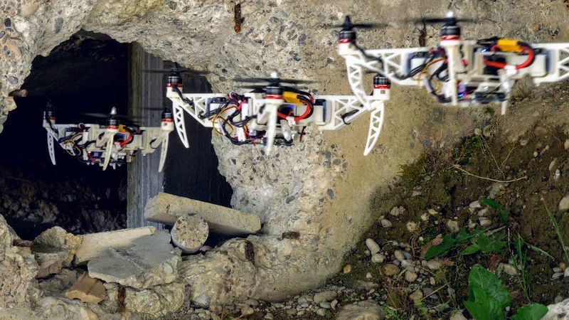 The new drone can squeeze itself to pass through gaps and then go back to its previous shape, all the while continuing to fly. (UZH)