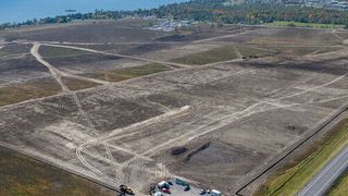 Aerial picture of the site location and future construction site of Umicore battery materials gigafactory in Loyalist, Canada - taken in September 2023. (Source: Umicore)