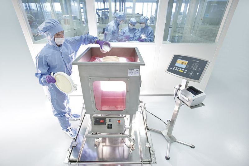 Preparation of Media and Buffers for Cell Cultivation in the Biopharmaceutical Industry: Cells need optimal ambient conditions so that they can successfully propagate. In addition to the agitation speed of a bioreactor and temperature, the dissolved oxygen saturation and pH of the medium are decisive for cell growth. Media and buffers in single-use bags equipped with a magnetic impeller assembly are stirred in large mixing tanks. Then these media are pumped through sterile tubing into the bioreactor. (Picture: Sartorius)