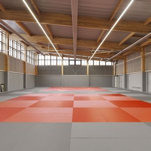 Die weitläufigen Hallen des Programms wurden als ein Weiler mit rudimentären Scheunen konzipiert. (Bild:  Guillaume Amat)