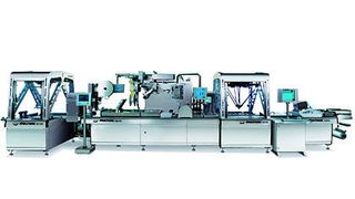 In vielen Tiefziehmaschinen werden zum Aufbringen von Etiketten Querbahn-Etikettierer eingesetzt. Eine neue Generation dieser Druck- und Spendesysteme soll das Kennzeichnen einfacher und sicherer machen. Bild: Multivac (Archiv: Vogel Business Media)