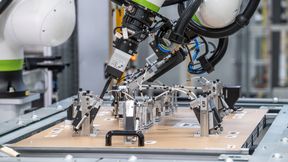 Im Projekt „Next2OEM“ entstand eine nahezu vollständig automatisierte Fertigung und Montage eines Fahrzeug-Kabelsatzes.  (Bild: Audi)