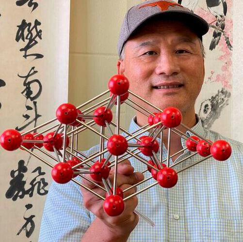 Co-lead author Jung-Fu “Afu” Lin holding a model of iron atoms arranged in the hexagonal structure thought to occur in the Earth’s inner core.