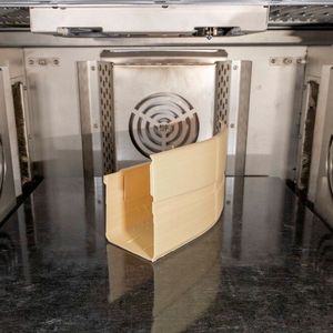 Ultem 9085 component in the build chamber of an Aim 3D Exam A 510(Source:  Aim 3D)