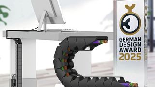 Die mit dem German Design Award ausgezeichnete Office Chain OCO von igus ermöglicht eine geordnete und sichere Leitungsführung.  (Bild: igus)