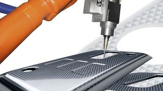 Krauss-Maffei fertigt am Stadort Harderberg Anlagen zur Nachbearbeitung von Kunststoffteilen, zum Beispiel aus CFK. Bild: Krauss-Maffei (Archiv: Vogel Business Media)