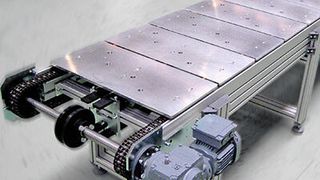 Das Umlaufsystem UMS ist eine wirtschaftliche Lösung mit geringem Raumbedarf für die Verkettung von Bearbeitungsmaschinen oder für Roboterzuführungen. (Bild: Minitec)