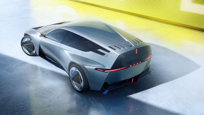 The steeply sloping rear end leaves room for luggage instead of sacrificing it for a coupe-style sloping roofline. (Source: Opel)