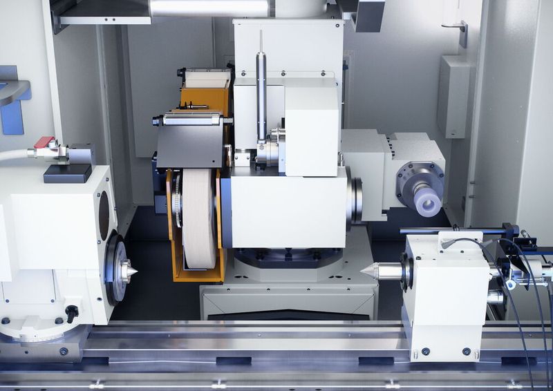 Work area of the Emag UG Series. The combination of swiveling B-axis and direct-drive spindles enables internal and external grinding. (Source: Emag)