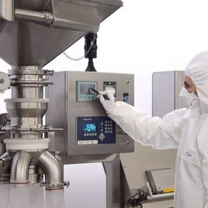 The lifting, connecting to the exhaust system, weighing and conveying into the packaging operations are performed under the supervision of the central control. 