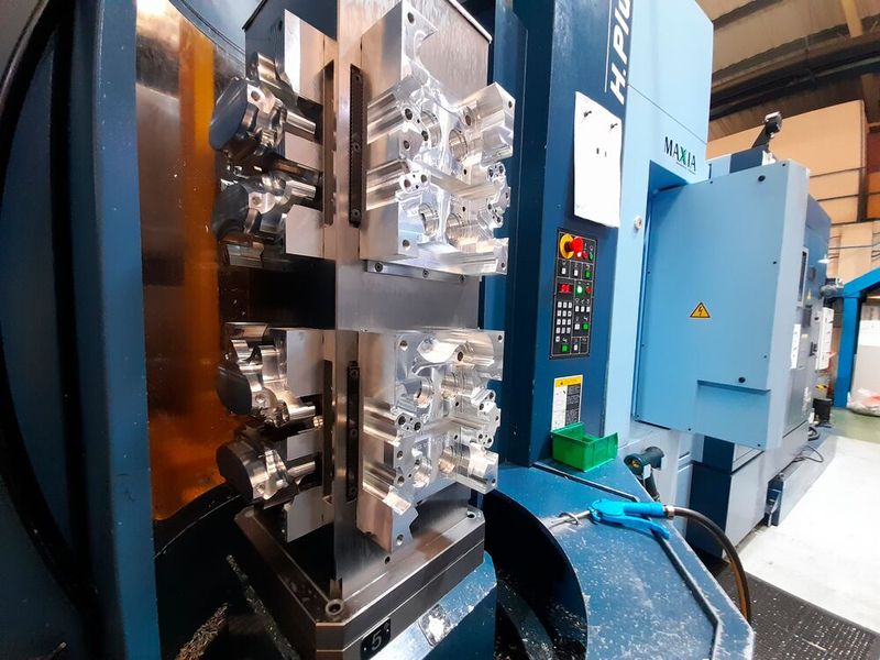 The Matsuura H.Plus 4-axis HMC with classic car brake calipers checked by Vericut (Source: Vericut)