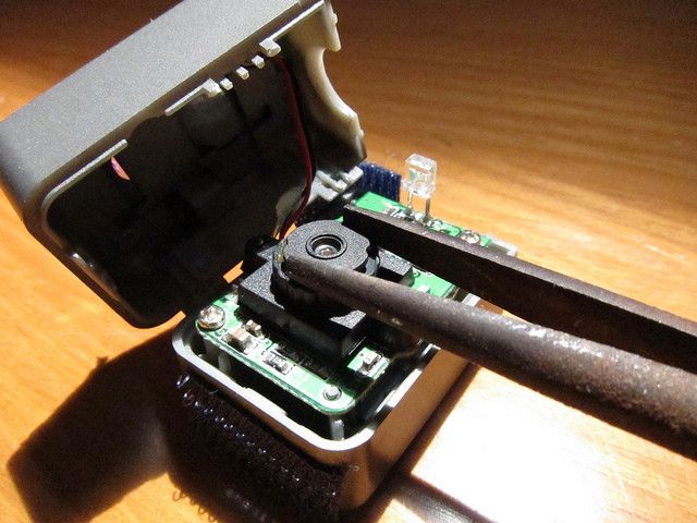 Unscrew the lens and remove the infrared filter. (PLOTS/CC BY 2.0)