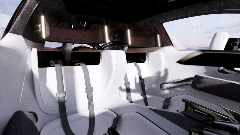 Die Sportsitze mit Hosenträgergurten werden von schwarzen Kopstützen komplettiert. (Bild: Nissan)