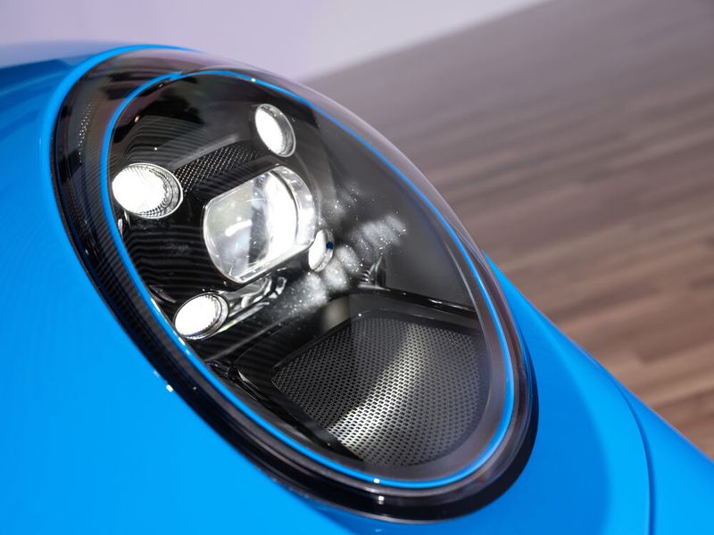 Für die Scheinwerfer gibt es optional Ringe in Wagenfarbe. (Bild: Auto-Medienportal.Net/Porsche)