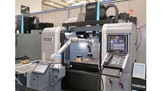 A Hurco Procobot will ne under power at Mach 2024 loading and unloading a 3-axis VM20i vertical machining centre. (Source: Hurco)