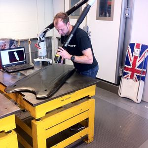 Making measurements to a sled that could be heading down the run in Sochi.