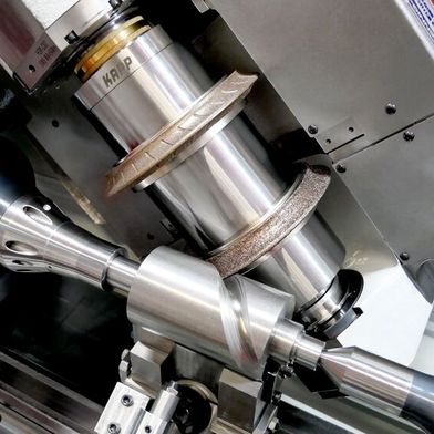 Grinding from solid material using two CBN profile grinding wheels for roughing. (Source: Kapp)