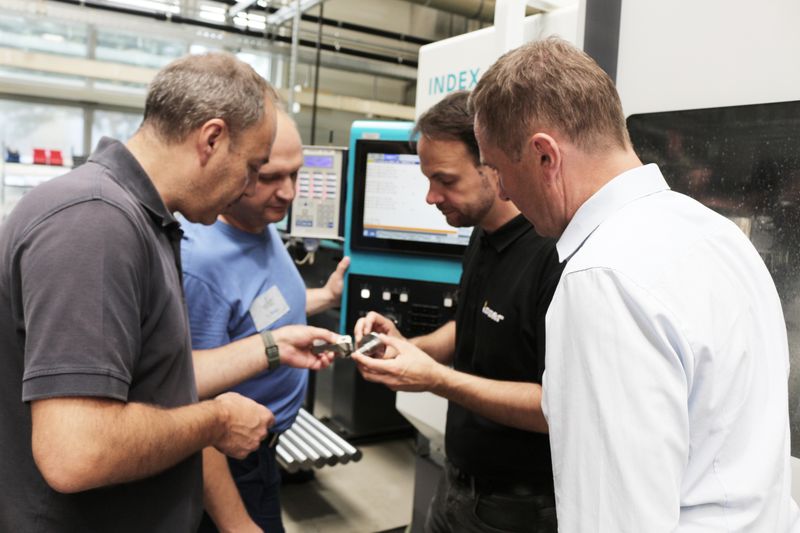 Convince themselves that machining with the Quickturn and the new strategy works (from left): Velibor Nisic from the set-up preparation center, Alexander Weber, process optimizer and programmer, both WST, application engineer Danny Schrödel and Thomas Nopper, consulting and sales, both Iscar. (Source: Iscar)