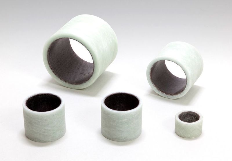 Für Maschinenbauer mit Leichtbau-Ambitionen und Hersteller in der Hydrotechnik hat Oiles wartungsfreie Composite-Gleitlager im Programm wie beispielsweise die Produkte der Reihe Oiles Fiberflon, die aus einem Phenolharz-Glasfaserverbund bestehen. (Oiles)