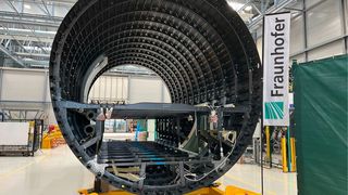 The MFFD aircraft fuselage segment assembled by thermoplastic welding at the Fraunhofer Society in Stade. (Image:Fraunhofer IFAM)