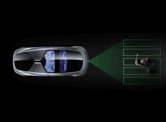 Mercedes-Benz F 015 - Luxury in Motion: Mit seinem hochpräzisen Laser-Projektionssystem kann das Fahrzeug wichtige Informationen in einem breiten Lichtkegel auf die Straße vor ihm projizieren. Zum Beispiel einen virtuellen Zebrastreifen, um Passanten am Straßenrand zu signalisieren, dass ein Überqueren der Straße gefahrlos möglich ist (Mercedes-Benz)