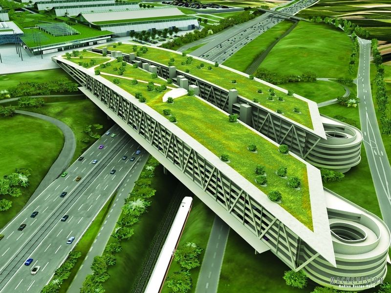 Parkhausriegel mit rund 4000 Plätzen auf sechs Ebenen. Das zweiteilige, bis zu 22 m hohe Parkhaus wurde 100 m freitragend über die Autobahn A8 und die geplante ICE-Trasse gespannt. (Archiv: Vogel Business Media)