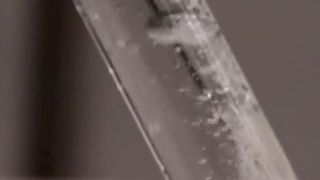 Bubbles of hydrogen gas are generated from the reaction of water with an aluminum-gallium composite. (Amberchan et al., Applied Nano Materials 2022)