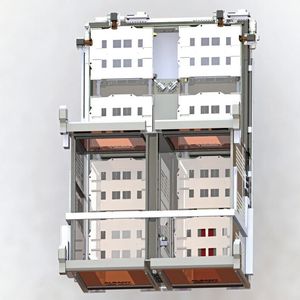 Die Schleusenanlage von oben, unten rechts Einfahrt, unten links Ausfahrt, mit jeweils zwei leeren Bodenrollern in der Schleuse und (oben) zwei zwischen Schleuse und Fertigungslinie. 