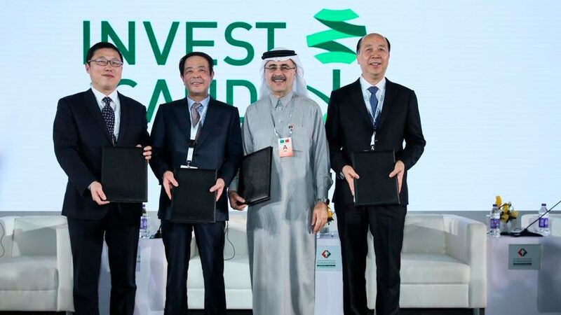 Saudi Aramco CEO, Amin Nasser, with the Chairman of Juhua, Hu Zhongming (far left); the Chairman of Rongsheng, Li Shuirong (second to the left) and the Chairman of TongKun, Chen Shiliang (right). (Saudi Arabian Oil Co.)