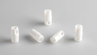 Composant destiné à un auto-injecteur, fabriqué avec une précision au millionième près sur la machine Engel E-Mac. (Bild: Ange)