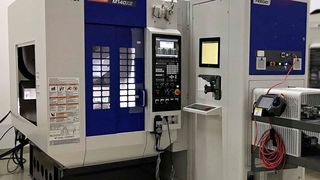 The automated production cell comprising Brother Speedio M140X1 5-axis mill-turn centre equipped with a Feedio automation system has arrived in the Whitehouse Machine Tools showroom in Kenilworth, ready for shipment to Southern Manufacturing 2019. (Whitehouse)