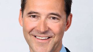 Christian Rönsch spricht auf den Autovertriebstagen 2017. (Autohaus May & Olde GmbH)