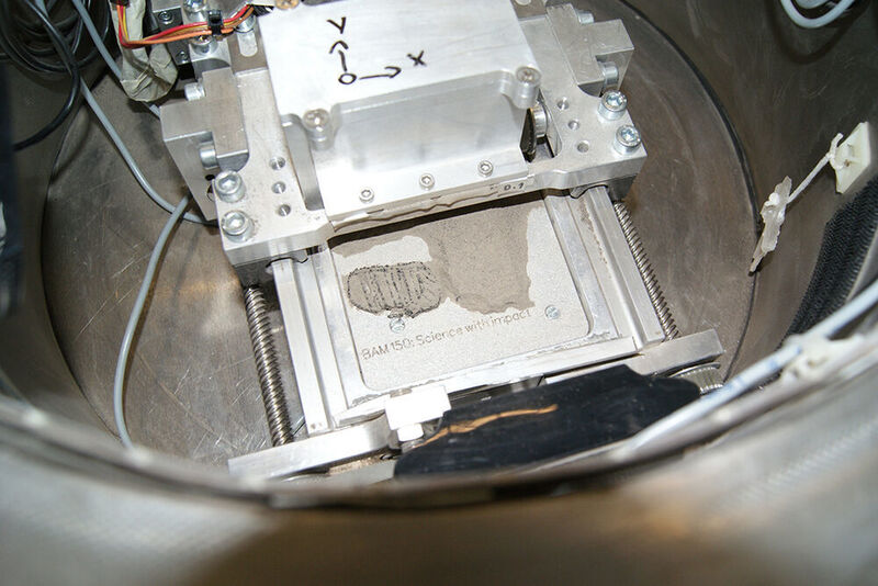 Researchers print Neil Armstrong's famous footprint from lunar dust simulant during a parabolic flight. (BAM)