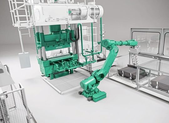 Nach dem Aushärten im Werkzeug wird das Bauteil von einem Roboter entnommen und in einen Pufferspeicher abgelegt (Bild:  Wickert)