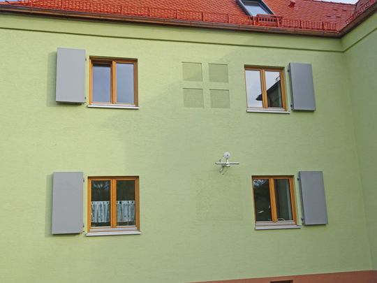 (Energetische Sanierung: Das Mehrfamilienhaus im Regensburger Stadtteil Margaretenau wurde Schritt für Schritt zu einer Musterlösung für energieoptimiertes Wohnen. Bild: Maxit)