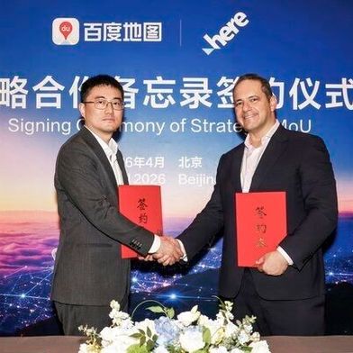 Baidu Maps und Here Technologies besiegeln ihre Zusammenarbeit mit einem Handschlag (Bild: HERE Technologies)