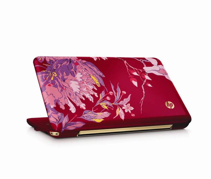 Das digitale Clutch (Handtasche) ist leuchtend Rot und mit blühenden Pfingstrosen designt. (Archiv: Vogel Business Media)
