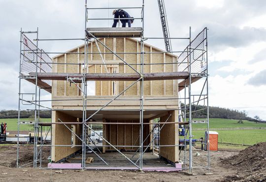 (Ansicht Hauskonstruktion inklusive statischer Holzüberzüge. Bild: Bohl Architekten, Wolfhagen)
