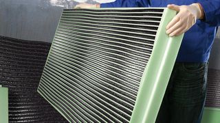 The green plate of Styrodur C  is an example of expanded polystyrene. (Bild: BASF)