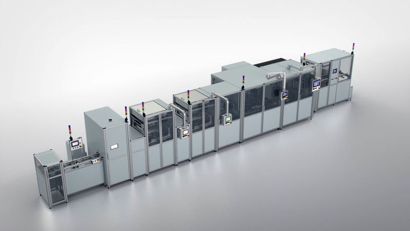 System example: From right to left, magazine storage, user separation, robot cell, optical measurement of the saw cut, FKT and ICT, laser marking, manual workstation and lift are combined. (Image:Pematech)